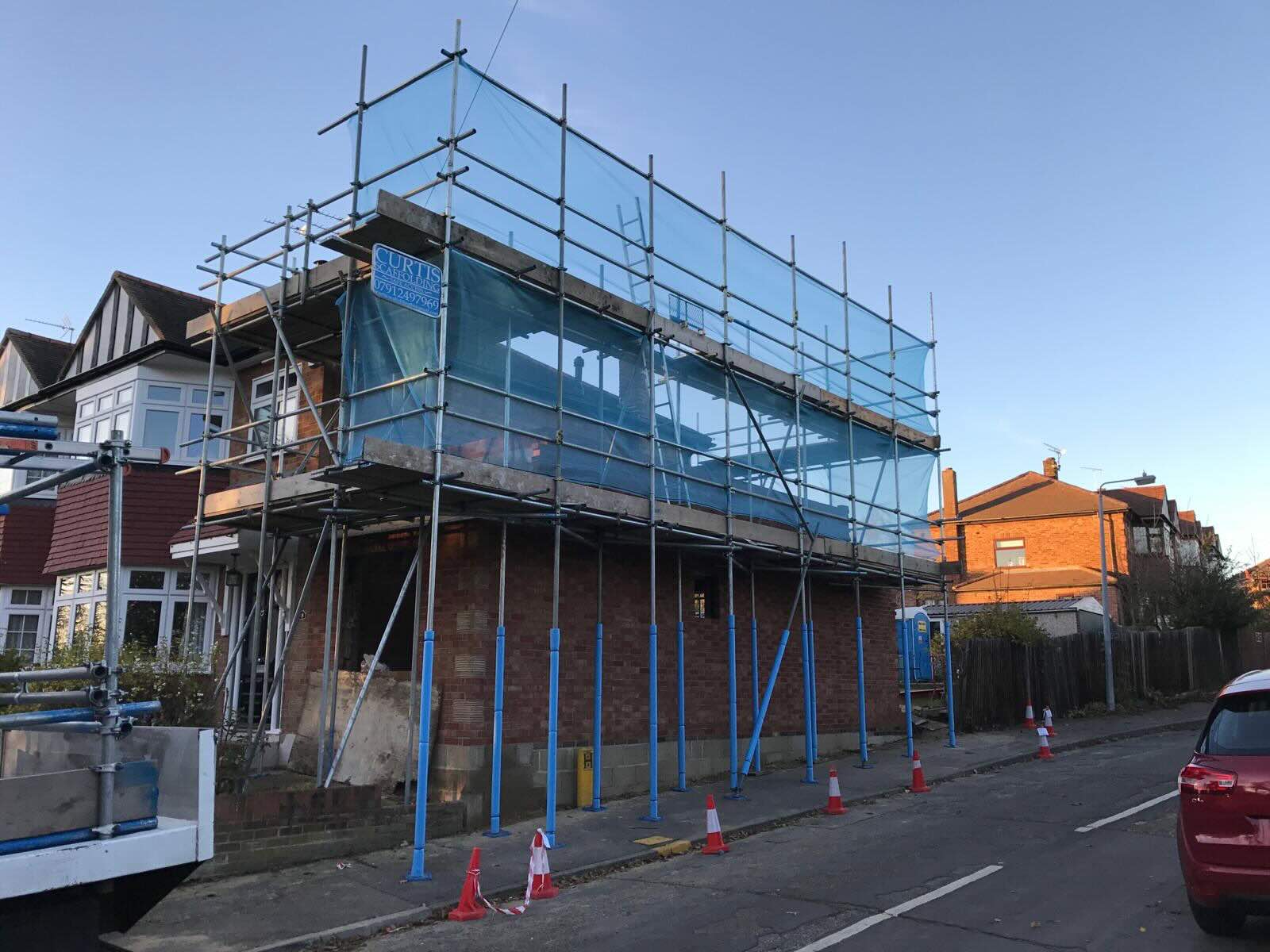 Scaffold with sky in the background