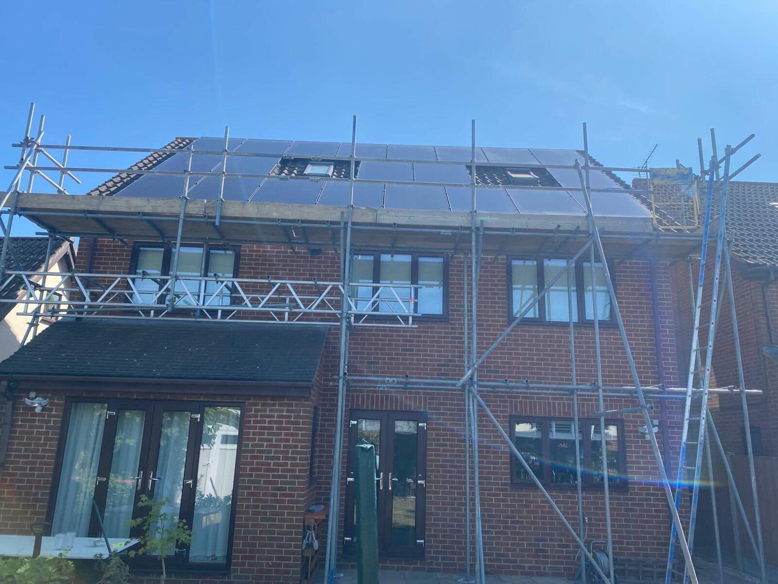 Scaffold with sky in the background